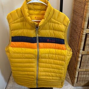 Cotopaxi Vibrant Yellow Vest with Bold Orange and Navy Stripes